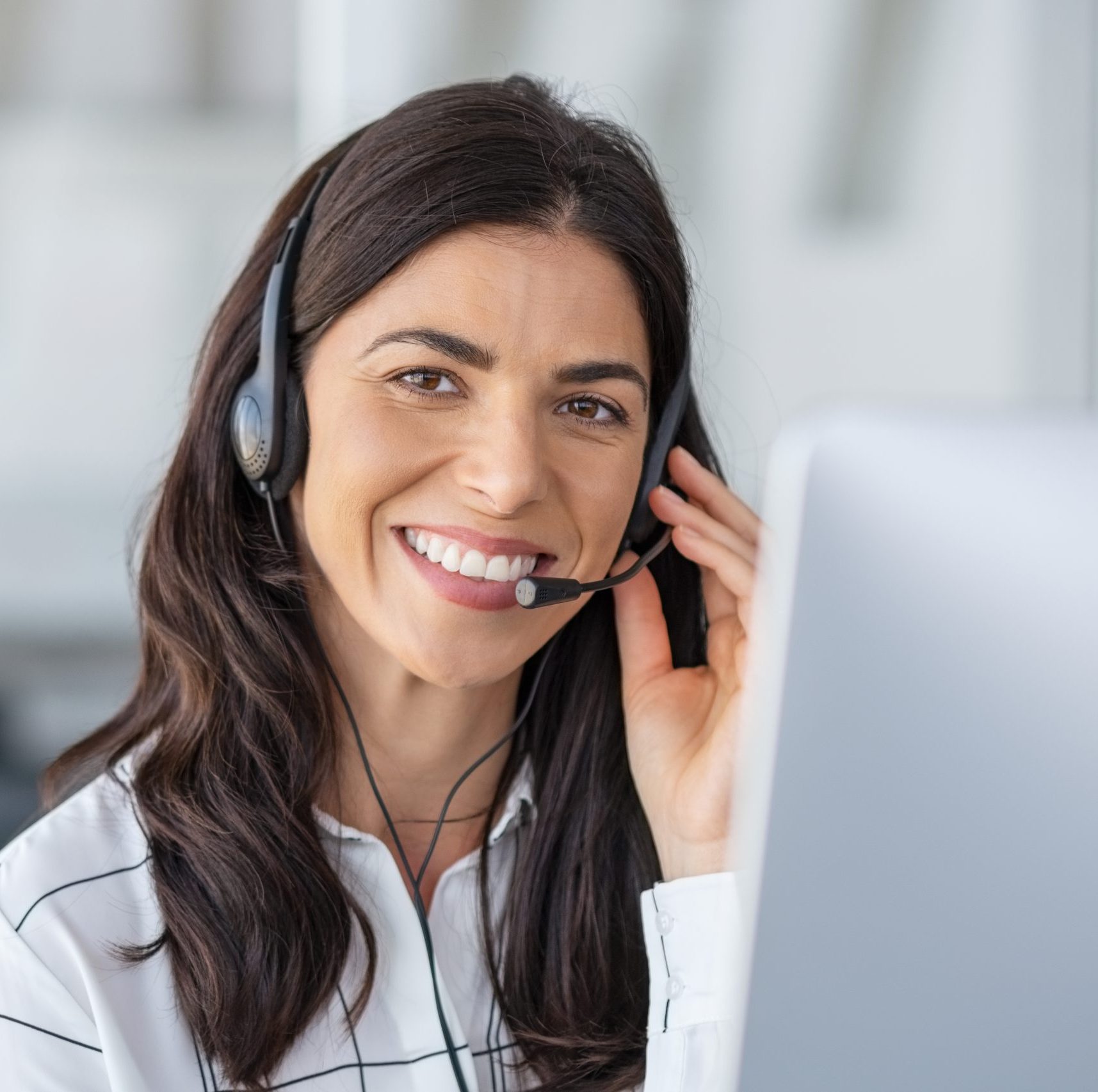 Happy smiling woman working in call center Happy smiling woman working in call center